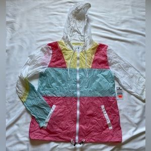 Zine size small wind breaker from zumiez pink yellow and blue